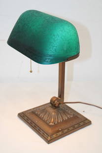 Original Emeralite Desk Lamp With Vine And Leaf Etched Shade: Original Emeralite desk lamp with vine and leaf etched shade. Double knuckle adjustment, no chips or cracks. Estate fresh with original Emeralite lamp tag. 9" wide, 14" tall, 8" deep.