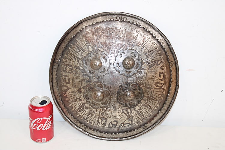 Nice 14" Shield With Scene Of A Precession Of People Walking: Nice 14" shield with scene of a precession of people walking. Has a damascene silver work. Estate fresh in nice condition.