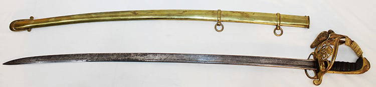 Civil War Style Sabre And Scabbard: Civil war style sabre and scabbard. Probably a model 1840. Blade has reminisce of etching (but it's worn). Nice brass scabbard. Blade is 31.5" long. Estate fresh.