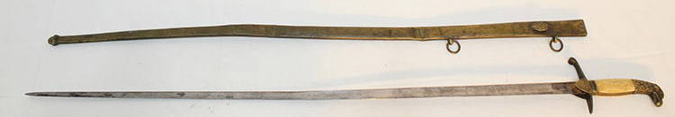 US Eagle Head Sword And Scabbard: US eagle head sword and scabbard. 32" blade with engraving scabbard. Has creases, missing pieces on the handle (see photo). Estate fresh.