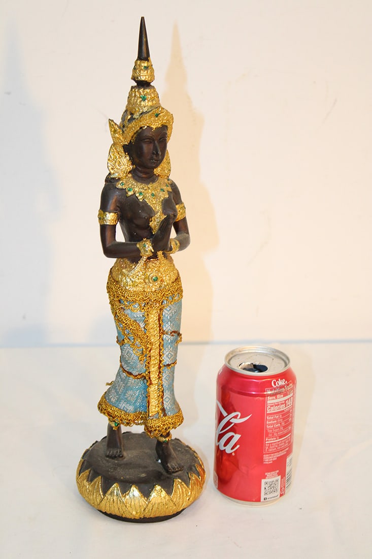 Bronze Buddha Pf Theppanom (The Protector): Bronze Buddha pf Theppanom (the protector). Has an applied fabric dress and accessories. Estate fresh. Appr. 16" tall.