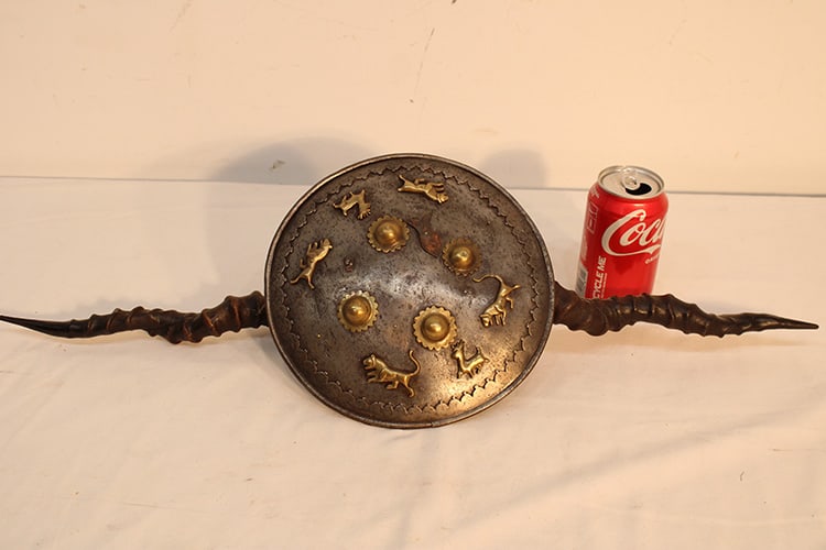 Antique Indian Madu With Double Horn Daggers: Antique Indian madu with double horn daggers. Has a shield with animals, copperfish (might be missing a couple of animals - see photo). Private collection. 27" wide, 9" tall.