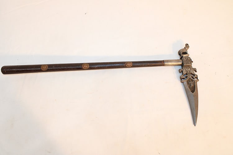 Fine Indian Zagnal Axe: Fine Indian zagnal axe. Fancy pictural blade with figures and animals. Wood shaft with copper engraved faces. Probably 19th C. Private collection. Overall length is 22".