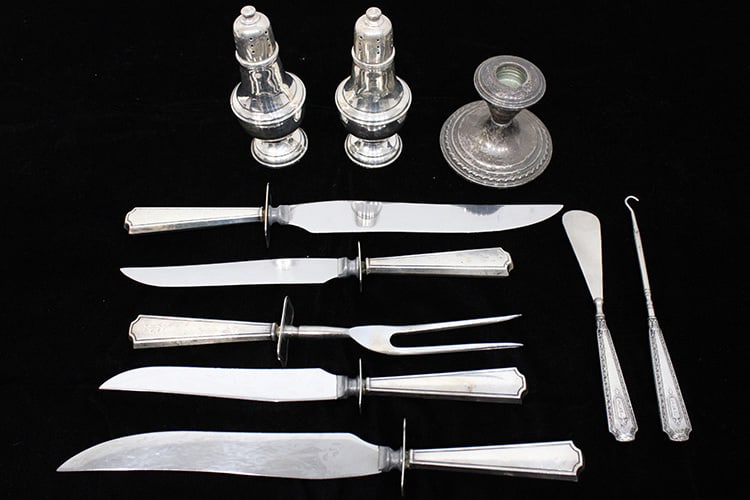 10 pieces of weighted sterling silver including serving knives, nice pair of lightly weighted salt: 10 pieces of weighted sterling silver including serving knives, nice pair of lightly weighted salt and peppers, etc. Estate fresh.