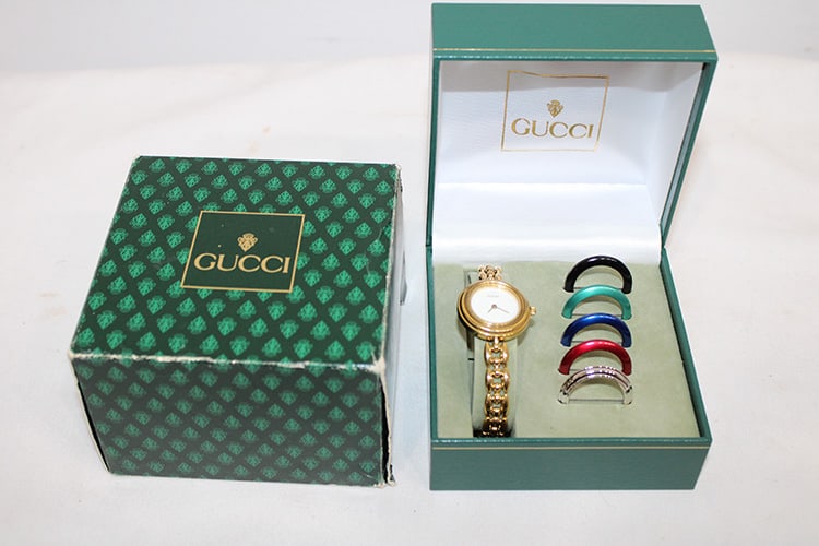 Vintage Gucci watch with interchangeable bezels. Original case and box. Richmond estate.: Vintage Gucci watch with interchangeable bezels. Original case and box. Richmond estate.