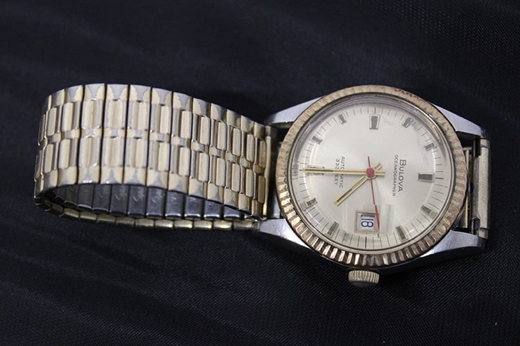 Vintage Bulova oceanographer with a 10k gold bezel (running) in nice condition. Serial #J10766.: Vintage Bulova oceanographer with a 10k gold bezel (running) in nice condition. Serial #J10766. Richmond estate.