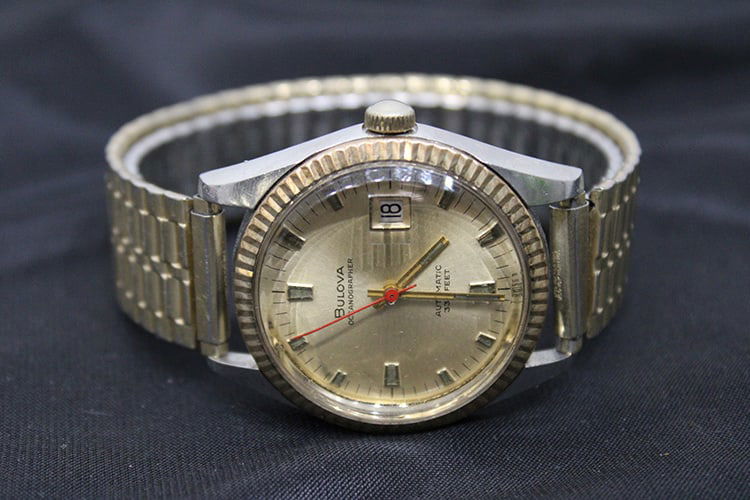 Vintage Bulova oceanographer with a 10k gold bezel (running) in nice condition. Serial #J10766. - 2