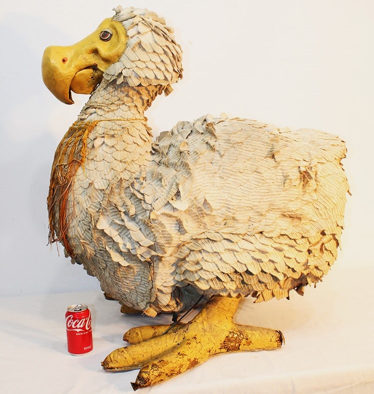 Outrageous large folk art dodo bird. Has a lift up beak and cloth covered body. Looks to be hand: Outrageous large folk art dodo bird. Has a lift up beak and cloth covered body. Looks to be hand covered paper mache. Old and real neat. Definitely a conversation piece. Appr. size 32" wide, 34"
