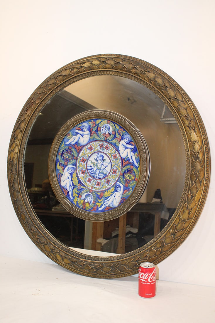 Super 38" Italian mirror with porcelain center. Has a fancy original gold frame, probably 19th C.: Super 38" Italian mirror with porcelain center. Has a fancy original gold frame, probably 19th C. marked on the charger Rubboli & Sons Gualdo Tadino Italy. The original charge in the center has 4