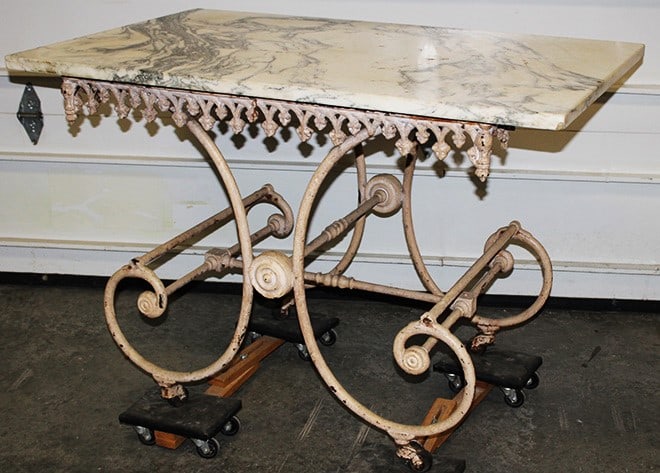 Wonderful French 19th C. wrought iron patisserie table with marble top, original caster. Has a (1 of 6)