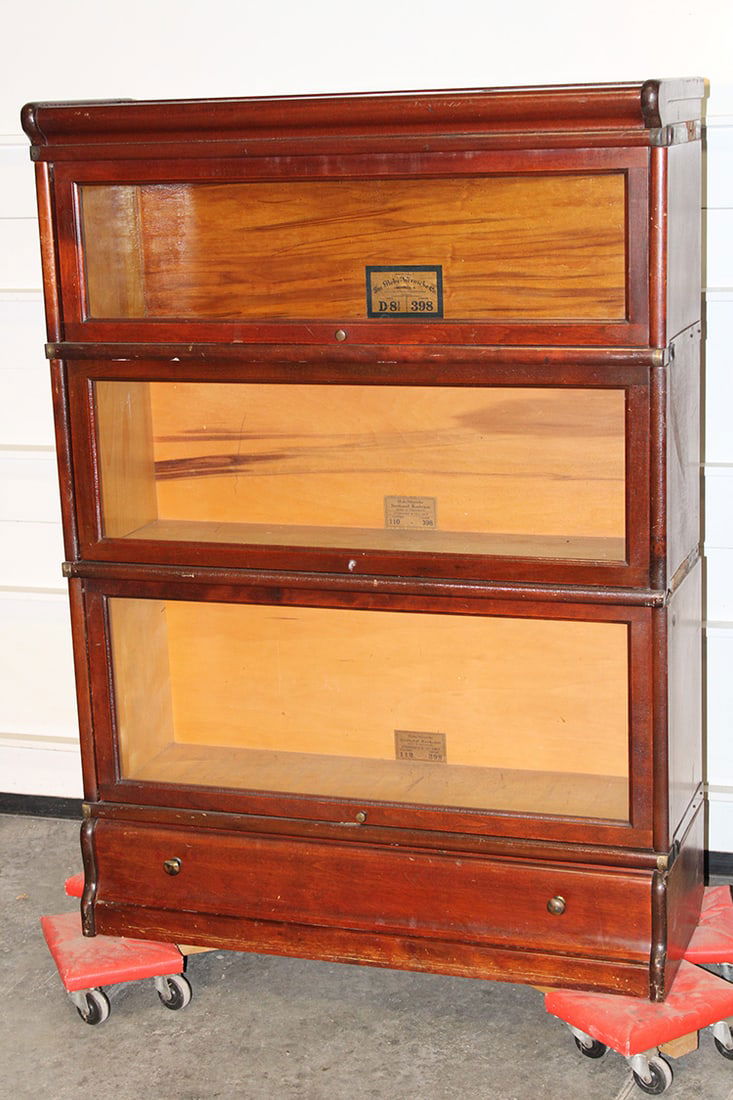 3 section Globe Wernicke stacking bookcase. 1 drawers base, mahogany finish. Missing 1 strap on the (1 of 7)