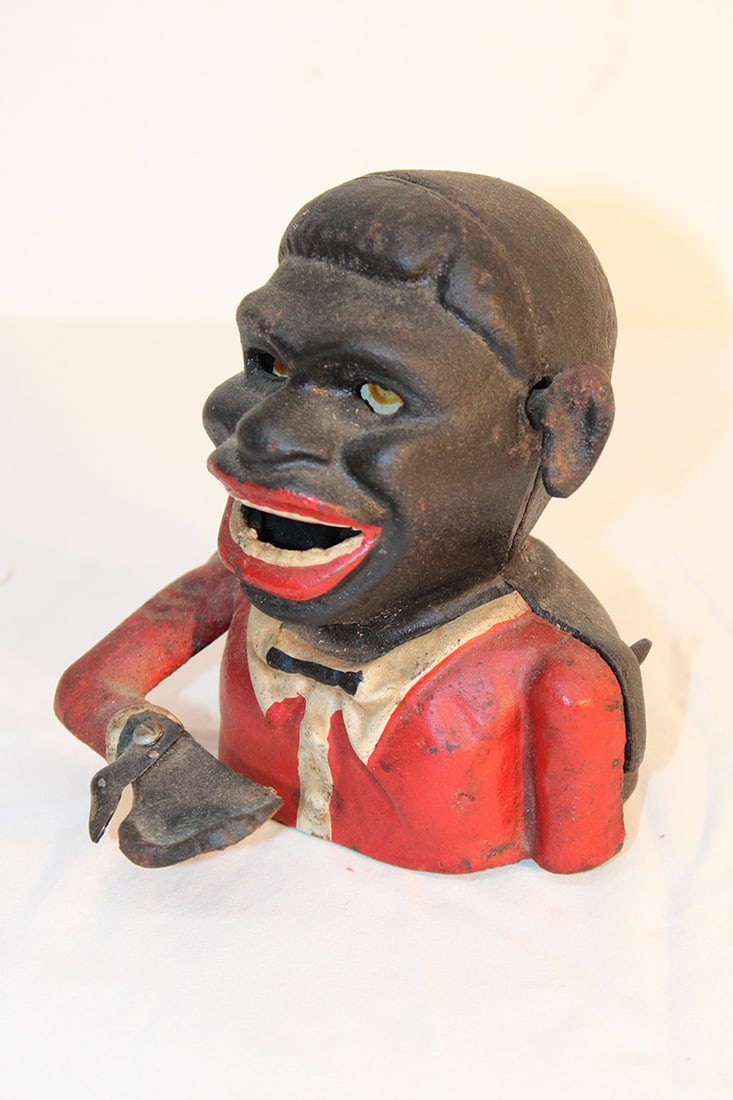 1 black memorabilia mechanical bank. Probably mid 20th C. in original paint. Eyes and ears move. (1 of 5)