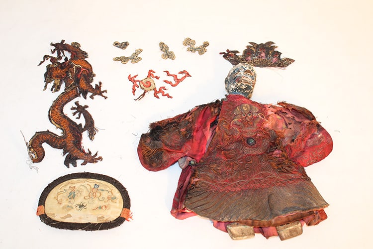 Early hand made Chinese shadow puppet. Hand made with wooden head and feet plus group of hand made: Early hand made Chinese shadow puppet. Hand made with wooden head and feet plus group of hand made silk patches. Estate fresh. Some tattering on the dress. Has rips and wear. Real neat.