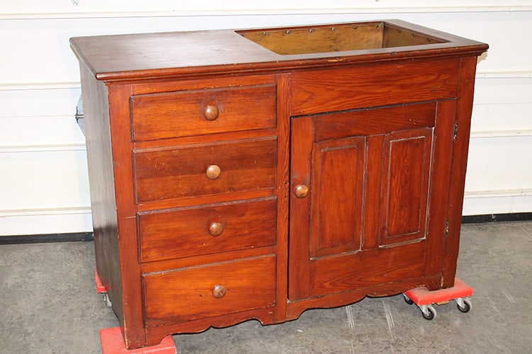 Nice antique pine dry sink with a copper lined dry sink. Raised paneled doors, 4 drawers in a very: Nice antique pine dry sink with a copper lined dry sink. Raised paneled doors, 4 drawers in a very nice finish. Estate fresh. 48" wide, 34" tall, 23" deep.