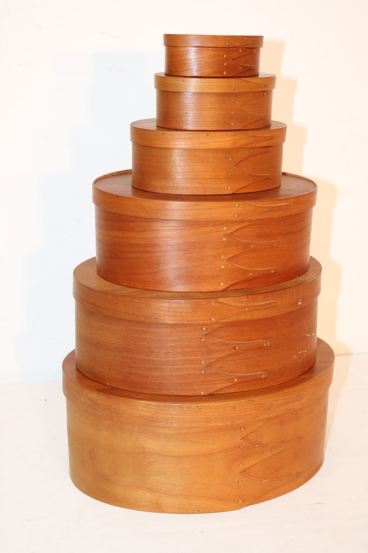 Set of 6 stacking oval Shaker finger boxes. Marked Shaker Workshop. Smallest is marked Orleans (1 of 6)