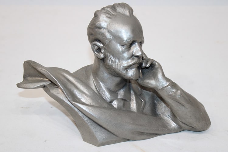 1960s bust of Russian composer Pyotr Iiyich-Tchaikovski. Silver color metal, probably silumin.: 1960s bust of Russian composer Pyotr Iiyich-Tchaikovski. Silver color metal, probably silumin. Signed and dated on the back, looks like A. Topny 1966. Estate fresh. 10" wide, 6.5" tall.