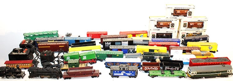 Group of mostly Lionel trains and accessories. Has engines, transformers, cars, etc. All estate (1 of 10)