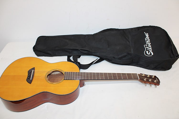 Like new Yamaha CSF1M acoustic guitar. Estate fresh. Has a soft case, real nice. Doesn’t look like: Like new Yamaha CSF1M acoustic guitar. Estate fresh. Has a soft case, real nice. Doesn’t look like it's ever been played. 37" long.