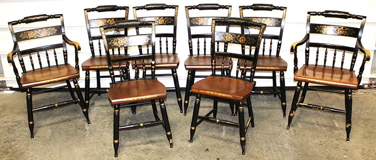 Set of 8 signed Hitchcock chairs. 2 arm chairs, 6 side chairs. Black and gold stenciling. Chairs are (1 of 5)