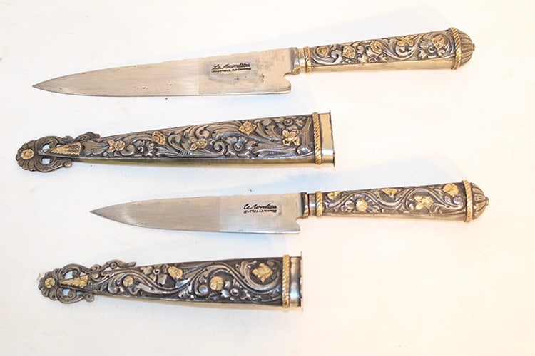 2 vintage La Movediza Argentina 800 silver and gold guacho dagger. Large and small very fancy in: 2 vintage La Movediza Argentina 800 silver and gold guacho dagger. Large and small very fancy in nice condition. Pittsfield estate. Largest is appr. 11" long.