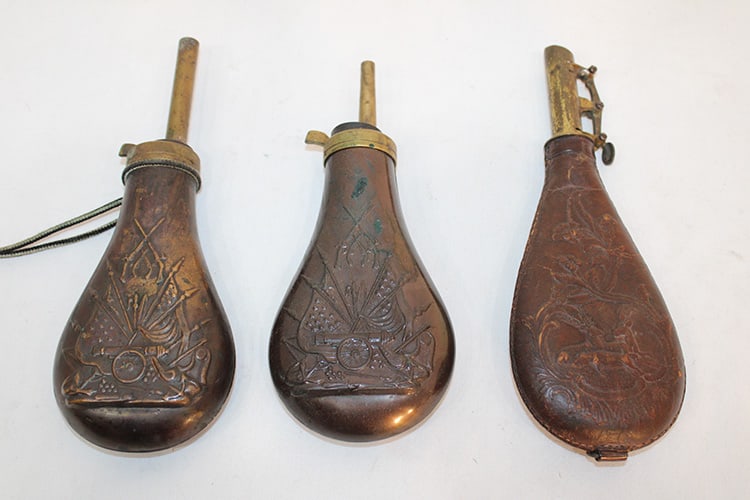 3 vintage powder flasks, 2 copper with a Civil War motif. The other is punch leather with deer (1 of 6)