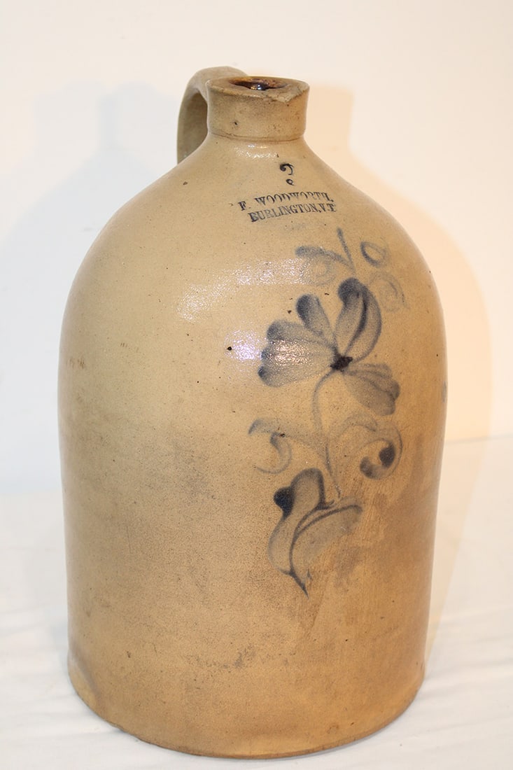 Nice 3 gallon F. Woodworth jug with cobalt blue flower in nice condition. Small flea bite on the rim (1 of 4)