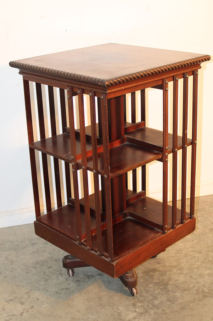 Nice Mahogany Signed Danner Revolving Bookcase: Nice mahogany signed Danner revolving bookcase. Has a nice rope twist edge on the top, rotated nicely. All in nice original finish. 21" wide, 35" tall, 21" deep.