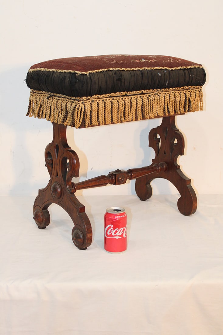 Fancy Walnut Victorian Lift Top Foot Stool: Fancy walnut Victorian lift top foot stool. Original finish, needlepoint seat. Missing the flat bottom board (see photo). 21" wide, 21" tall, 12" deep.