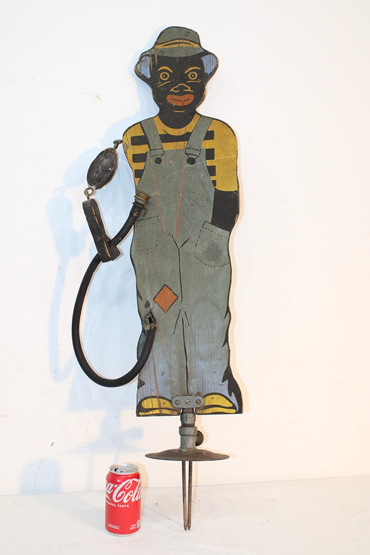 Super Original "Sprinklin Sambo" All Original Paint: Super original "Sprinklin Sambo" all original paint. Has the original nails for the ground and hose (hose has a split). Retains almost all of the original paint. Very nice black memorabilia collectibl