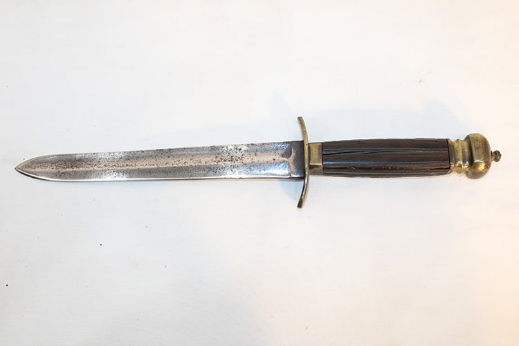 Antique Georgian Officers Naval Dirk: Antique Georgian officers Naval dirk. Rosewood or ebony fluted grip, single edge fullered blade. Western MA estate. Overall length is 14".