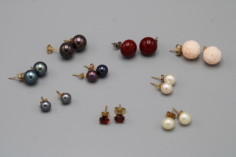 Nice Assortment of Stud Earrings: Nice Assortment of Stud Earrings. Including pearls, rubys, etc. Most shafts are 14K gold, 9 pairs in all. Vermont estate.