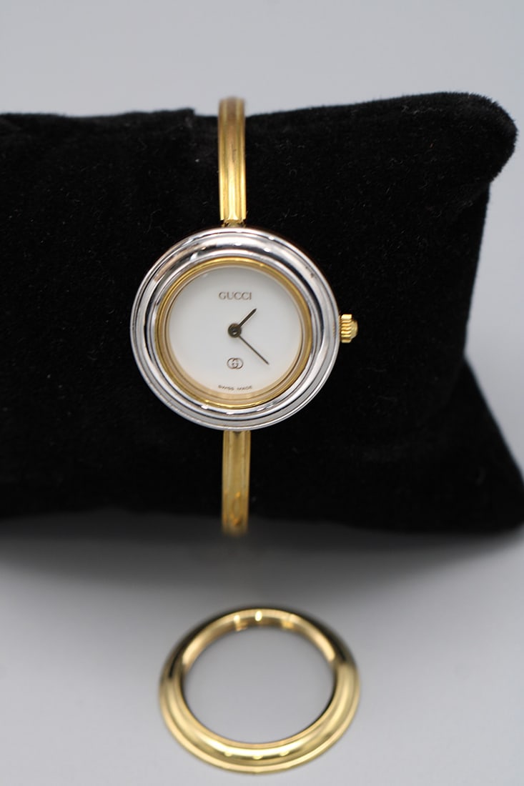 Gucci Watch 11/12 Change Bezel with White Silver Dial: Gucci Watch 11/12 Change Bezel with White Silver Dial. Silver & gold bezels. Vermont estate.