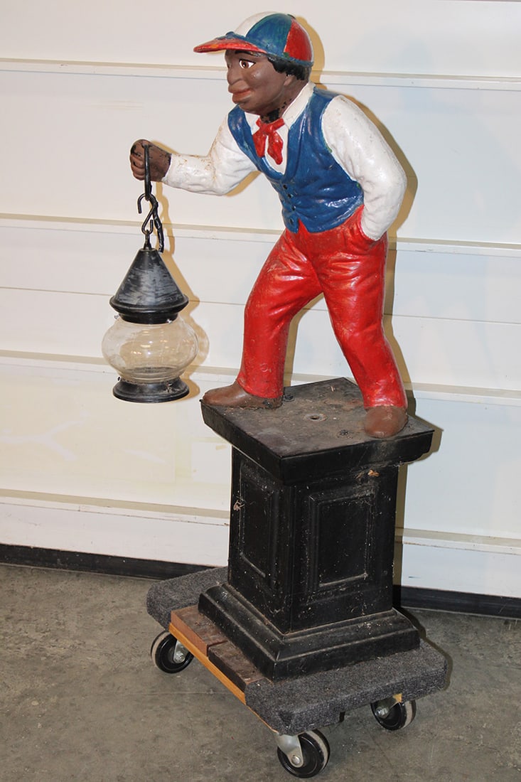 Cast Iron Lighted Lawn Jockey with a Lantern: Cast Iron Lighted Lawn Jockey with a Lantern. Nice condition, estate fresh. 38" tall.
