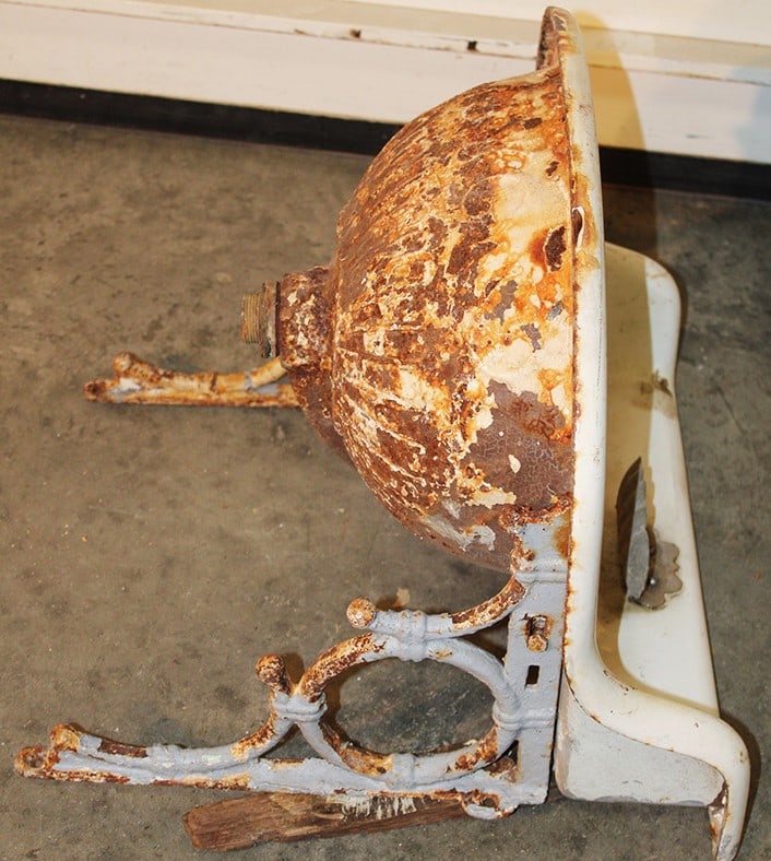Cute Small Antique Cast Iron Sink: Cute Small Antique Cast Iron Sink. Fancy bottom with original brackets and soap holder, the porcelain is dirty around the drain (great project). Approximate size is 20" wide, 19"tall, 18" deep.