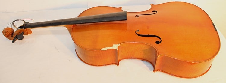 Labeled Samuel Eastman 4/4 V-C100 Cello: Labeled Samuel Eastman 4/4 V-C100 Cello. Has some damage. Year 2000, estate fresh. Body is approximately 30" total length 49" long.