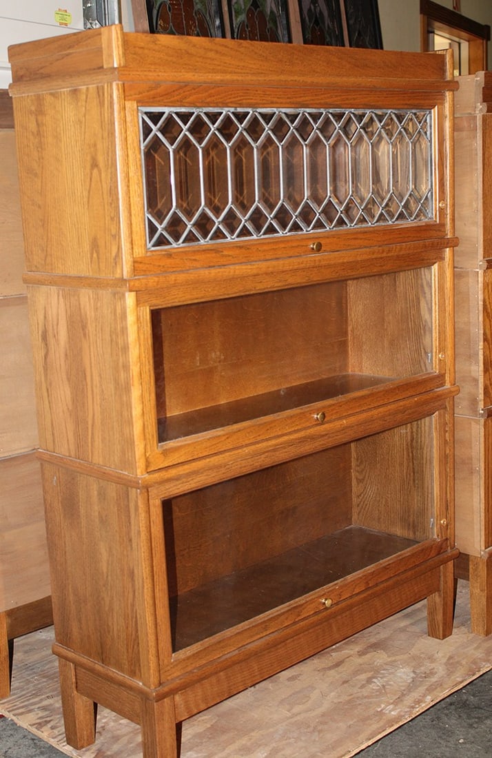 Pristine Contemporary 3 Section Hale Bookcase with Leaded Top: Pristine Contemporary 3 Section Hale Bookcase with Leaded Top. Great condition, beveled diamond leading, with individual keys. From Kingston Ny estate. 34" wide, 49" tall, 11" deep.