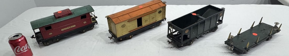 4 - Standard Gauge Train Cars 214, 216, 217, 511: 4 - Standard Gauge Train Cars 214, 216, 217, 511. Original condition, has wear, from Agawam, MA estate. Approximately 12" wide.