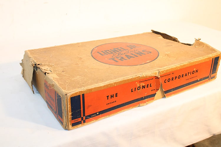 Lionel Jr. Electric Train in the Original Box: Lionel Jr. Electric Train in the Original Box. The engine is in as is condition, the rest is in nice original condition, box tattered. From Agawam, MA estate, has wear.