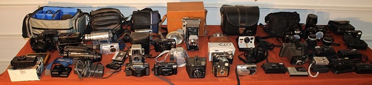 A huge Collection of Vintage Cameras & Accessories: A huge Collection of Vintage Cameras & Accessories. All from one estate. We did not check them for working condition. Many are dusty & need cleaning.