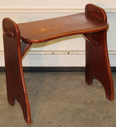 Rare Cushman Colonial Creations for "Molly Stark" Model 2052 Vanity Bench: Rare Cushman Colonial Creations for "Molly Stark" Model 2052 Vanity Bench. Little wear on the seat finish (see photo), in nice condition. North Adams estate. 23" wide, 21" tall, 12" deep.