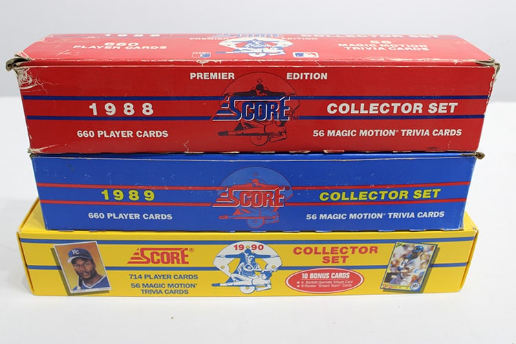 1988-1990 Score Baseball Cards: 1988 Score baseball complete set plus Rookies & Traded in original boxes. 1989 Score baseball complete set, Rookie & Traded in original boxes, plus Superstar set & New York Yankees set. 1990 Score