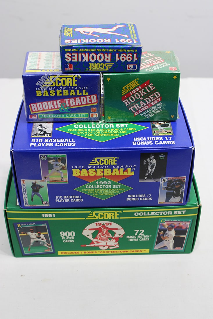 1991 & 1992 Score Baseball Cards: 1991 Score baseball complete set in original box plus Rookie & Traded in sealed box. 1992 Score complete set in original box plus Rookie & Traded in sealed box. 1991 Rookie Glossy Box. All are like