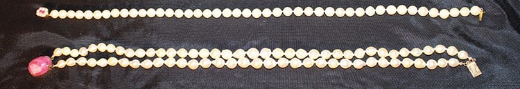 2 Nice 14K Gold And Pearl Necklaces: 2 nice 14k gold and pearl necklaces. (1) with tourmaline type center stone, (1) with small ruby and pearl clasp. All in nice condition, estate fresh. (1) 15", (1) 16".