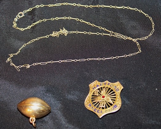 Group Of 10K Gold Including Foot Ball Pendant 5 Dwt: Group of 10k gold including foot ball pendant 5 dwt. Hartford wheel club pin and chain.