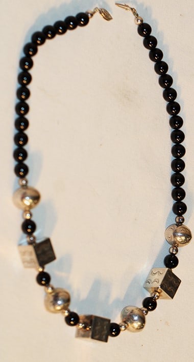 Sterling Silver And Black Onyx Necklace: Sterling silver and black onyx necklace. Possibly native American. Estate fresh. 17" long.
