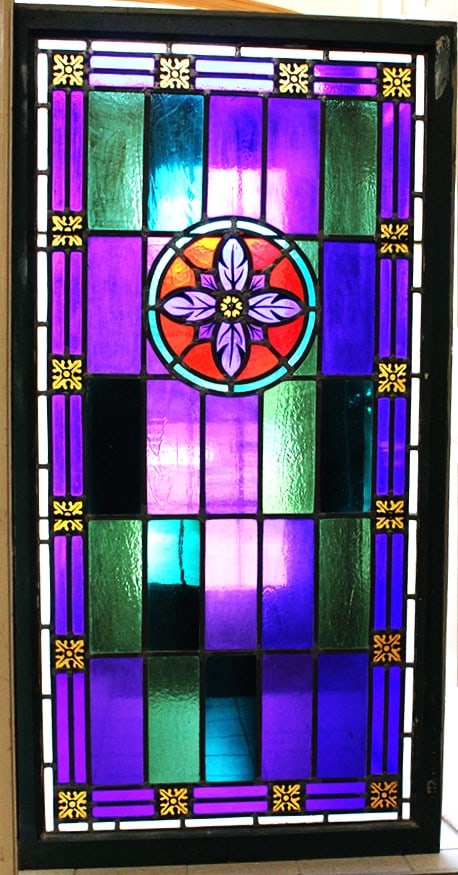 Pair of Antique Multi-colored Leaded Windows: Pair of Antique Multi-colored Leaded Windows. In the original frames, glass looks to be real nice (one line). Has etched square designs and fancy medallion in the center. Appr. 32" X 61".