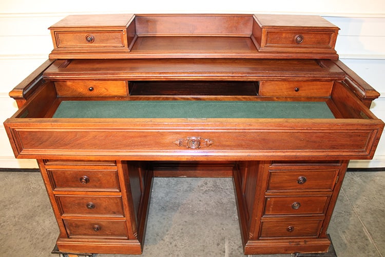 High Style Raised Panel Mechanical Walnut Desk: High Style Raised Panel Mechanical Walnut Desk. The top lid pushes back and the desk pushes forward and drops down. Right hand bank has 3 fake drawers, opens to cubby's. Sheffield estate. 60" wide X 4