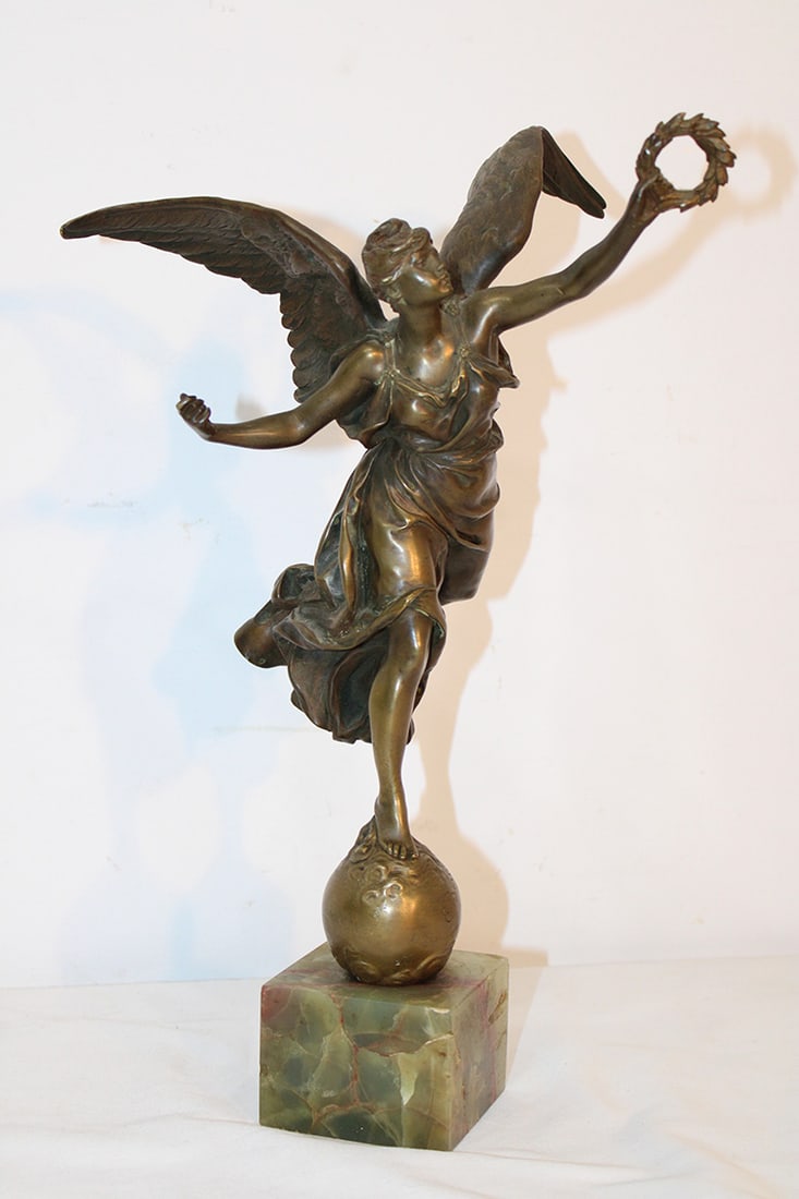 Antique Bronze Titled "Larenommee" by Ernest Barrias 1841-1905: Antique Bronze Titled "Larenommee" by Ernest Barrias 1841-1905. Nice patina, onyx base, with a slight bend in one wing. Estate fresh. 15" tall.