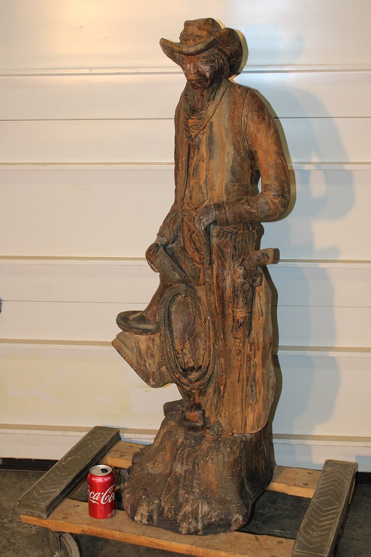 Wonderful Carved Stone 48" Real Cowboy Signed Apsit Bros. of California: Wonderful Carved Stone 48" Real Cowboy Signed Apsit Bros. of California. Interictally carved stone, rust color, very heavy and detailed. In nice condition.