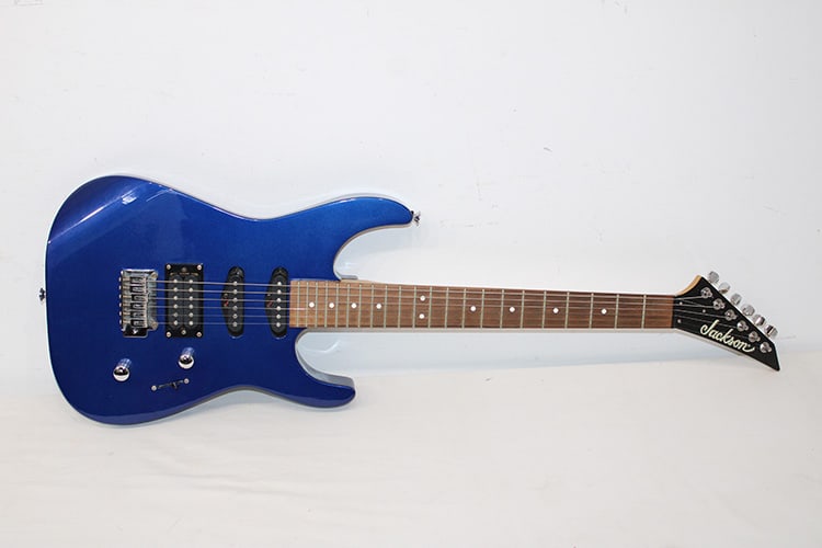 Jackson Electric Guitar In Blue: Jackson Electric Guitar In Blue. Serial #200501050. In nice condition, estate fresh. Appr. 37" long.